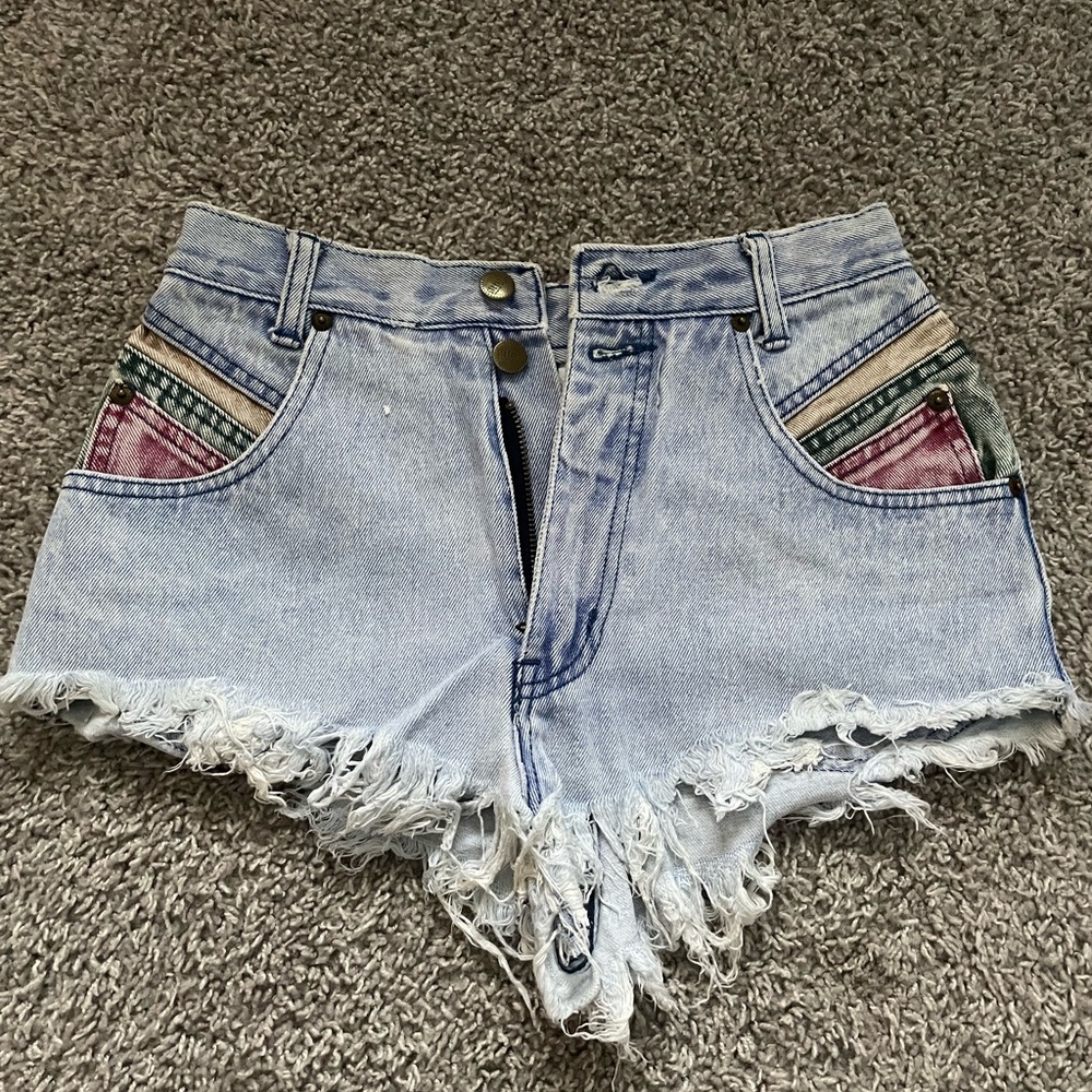 Light wash rasta print cheeky denim shorts